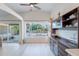 Dining room features a display cabinet with shelving and sliding glass door to backyard at 3404 E Lavey Ln, Phoenix, AZ 85032