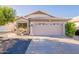 Charming single-story home featuring a two-car garage, manicured landscaping, and a welcoming facade, ideal for suburban living at 3404 E Lavey Ln, Phoenix, AZ 85032