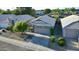 Aerial view of home in a quiet neighborhood showcasing low maintenance desert landscaping at 3404 E Lavey Ln, Phoenix, AZ 85032