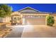 Charming single story home features a manicured lawn and attached two car garage at 3404 E Lavey Ln, Phoenix, AZ 85032