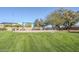 Community playground features swings and picnic tables, inviting families to enjoy outdoor activities in a green, friendly atmosphere at 3404 E Lavey Ln, Phoenix, AZ 85032