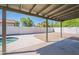 Enjoy outdoor living on this backyard with covered patio, desert landscape, and pool at 3608 W Fairview Ln, Chandler, AZ 85226