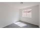 This bedroom features neutral walls, carpet flooring, and a window for natural light at 3608 W Fairview Ln, Chandler, AZ 85226