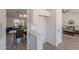 Bright kitchen transitions to dining area, with white cabinets and modern finishes at 3608 W Fairview Ln, Chandler, AZ 85226