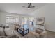 Spacious living room leads to backyard and features neutral tones and contemporary decor at 3608 W Fairview Ln, Chandler, AZ 85226