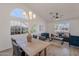Open-concept living room with lots of natural light, stylish decor, and comfortable seating at 3608 W Fairview Ln, Chandler, AZ 85226