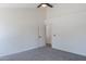 Bright main bedroom featuring neutral walls, carpet floors, and a ceiling fan at 3608 W Fairview Ln, Chandler, AZ 85226