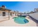 This backyard has a refreshing pool with desert landscaping, and a covered patio at 3608 W Fairview Ln, Chandler, AZ 85226