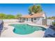 Backyard featuring a refreshing pool, desert landscaping, and covered patio at 3608 W Fairview Ln, Chandler, AZ 85226