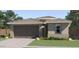 Charming single-story home featuring desert landscaping and a two-car garage at 36520 W Maddaloni Ave, Maricopa, AZ 85138