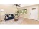 Cozy living room showcasing a comfortable sofa, modern furnishings, and a bright atmosphere at 3839 E Friess Dr, Phoenix, AZ 85032