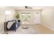 Inviting living room with neutral tones, stylish decor, and large window at 3839 E Friess Dr, Phoenix, AZ 85032