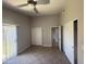 This bedroom offers abundant space, including ample closet storage at 3844 N 88Th Ln, Phoenix, AZ 85037
