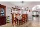The dining room includes a table for 6 and lots of natural light at 403 N Monte Vista St, Chandler, AZ 85225