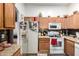 Functional kitchen with ample cabinetry, granite countertops, and modern appliances at 403 N Monte Vista St, Chandler, AZ 85225