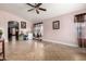 Spacious living room featuring tile flooring and a ceiling fan at 403 N Monte Vista St, Chandler, AZ 85225