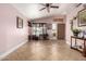 Open-concept living room with tile floors, high ceilings, and abundant natural light at 403 N Monte Vista St, Chandler, AZ 85225