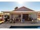 View of covered patio with a barbecue grill and furniture, perfect for outdoor gatherings at 403 N Monte Vista St, Chandler, AZ 85225