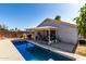 The pool is surrounded by a patio, perfect for lounging and enjoying the sunny weather at 403 N Monte Vista St, Chandler, AZ 85225