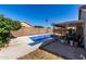 Private pool with steps, coping, lush greenery, and an adjacent covered patio for outdoor entertaining at 403 N Monte Vista St, Chandler, AZ 85225