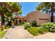 Charming home featuring well maintained desert landscaping, two car garage and a turret style living area at 4135 E Altadena Ave, Phoenix, AZ 85028