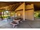Covered picnic area with tables and benches, perfect for outdoor gatherings and community events at 4135 E Altadena Ave, Phoenix, AZ 85028