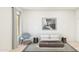 Bright bedroom with a modern bed, stylish decor, and a large window offering natural light at 42515 W Peters Dr, Maricopa, AZ 85138