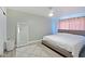 Bedroom with neutral paint, full-length mirror, and light hardwood flooring at 4600 N 68Th St # 351, Scottsdale, AZ 85251