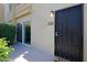 Inviting entryway with black security door at 4600 N 68Th St # 351, Scottsdale, AZ 85251