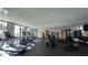 Spacious home gym featuring treadmills, weights, and large windows for a bright workout space at 5050 N Camelback Ridge Dr # 2306, Scottsdale, AZ 85251