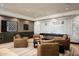 Cozy lounge area showcases comfortable leather chairs, a game table and decorative historical map wall art at 5050 N Camelback Ridge Dr # 2306, Scottsdale, AZ 85251