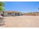 Wide angle view of a backyard covered in gravel and a block wall surround at 5434 W T Ryan Ln, Laveen, AZ 85339