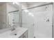 Modern bathroom featuring a glass enclosed shower and a sleek single sink vanity at 5434 W T Ryan Ln, Laveen, AZ 85339