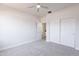 Clean bedroom with ceiling fan and closet offers comfortable living space at 5434 W T Ryan Ln, Laveen, AZ 85339