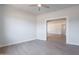Light-filled room with neutral walls creates an open and inviting atmosphere at 5434 W T Ryan Ln, Laveen, AZ 85339