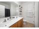 Well-lit bathroom with double sink vanity and modern fixtures at 626 W Tallula Trl, San Tan Valley, AZ 85140