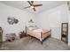 Comfortable bedroom with ceiling fan and neutral color palette at 626 W Tallula Trl, San Tan Valley, AZ 85140