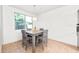 Cozy dining area featuring a modern table, chairs, and a stylish light fixture at 626 W Tallula Trl, San Tan Valley, AZ 85140