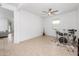 Bright and airy living room with abundant natural light and tile flooring, perfect for entertaining at 626 W Tallula Trl, San Tan Valley, AZ 85140
