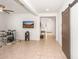 Spacious living room with modern sliding door, neutral walls, and tile floors, ideal for relaxation at 626 W Tallula Trl, San Tan Valley, AZ 85140