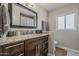 Cozy bathroom with granite countertop, mosaic backsplash, and warm lighting, creating a relaxing atmosphere at 6302 E Turquoise Ave, Paradise Valley, AZ 85253