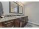 Beautiful bathroom vanity area with dual sinks, granite countertop, and modern fixtures at 6302 E Turquoise Ave, Paradise Valley, AZ 85253