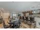 Bright, open-concept kitchen featuring a large central island, stainless appliances, and ample counter space at 6302 E Turquoise Ave, Paradise Valley, AZ 85253