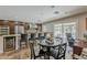 Spacious kitchen with breakfast bar overlooking the backyard pool, ideal for indoor-outdoor living at 6302 E Turquoise Ave, Paradise Valley, AZ 85253