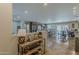 Spacious open-concept living space with natural light, modern decor, and seamless flow into kitchen at 6302 E Turquoise Ave, Paradise Valley, AZ 85253