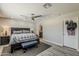 Relaxing primary bedroom with a king-size bed and calming neutral tones, creating a serene retreat at 6302 E Turquoise Ave, Paradise Valley, AZ 85253