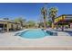 Outdoor pool featuring palm trees, cabana, and a patio with outdoor seating at 6302 E Turquoise Ave, Paradise Valley, AZ 85253