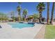 Outdoor pool featuring palm trees, cabana, modern design, and a well-manicured lawn at 6302 E Turquoise Ave, Paradise Valley, AZ 85253