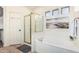 Bathroom with a walk-in shower, bathtub, and neutral color scheme at 6846 S 26Th Pl, Phoenix, AZ 85042