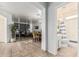 Open floor plan showcasing a living area, dining area, and a glimpse of a bathroom creating an ideal space for relaxation and entertainment at 6846 S 26Th Pl, Phoenix, AZ 85042